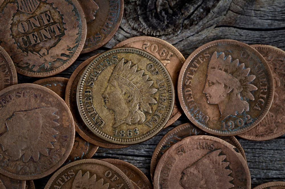 Vintage Indian Head pennies from the 1800s and 1900s, collectible items handled by Coin Buyers in College Station.